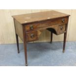 A GEORGE III AND LATER MAHOGANY LOW BOY WITH A LONG APRON DRAWER ABOVE TWO SHORT DRAWERS FLANKING