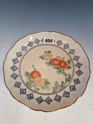 A 19th C. JAPANESE ARITA PLATE PAINTED WITH RED AND YELLOW CHRYSANTHEMUMS WITHIN A BAND OF