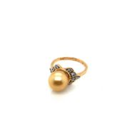 A HALLMARKED 9ct GOLD GOLDEN SOUTH SEA PEARL AND WHITE ZIRCON DRESS RING. PEARL APPROX 9mm. FINGER
