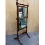AN 19th C.MAHOGANY FULL LENGTH CHEVAL MIRROR WITH A RECTANGULAR BEVELLED GLASS PLATE