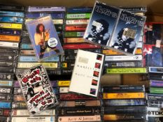 A QUANTITY OF CASSETTE ALBUMS, STILL SEALED/MINT. VARIOUS ARTISTS INCLUDING RADIOHEAD, THE DOORS,