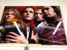 •DEAN CHALKLEY. ARR. THE KILLERS, COLOUR PHOTOGRAPHIC PRINT. ENCASED IN PERSPEX WITH METAL FRAME