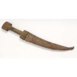 Tribal, possibly African or Middle Eastern, Jambia style dagger in leather scabbard, approx 40cm