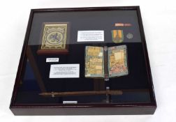 WWII display case with items from German occupied Holland to include civilian ration coupon