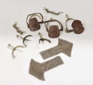 Quantity of six British 20th century military spurs together with pair of military chain mail