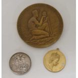 Small group of coins and commemorative medals/medallions to include a Victorian 1889 silver crown,