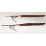 Pair of nickel plated pike heads on small turned wooden handles (a/f), rust on pike heads, approx