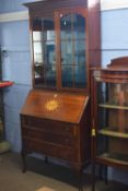 Edwardian mahogany bureau bookcase cabinet, the top section with two glazed doors over a body with