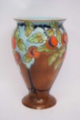Crown Devon Cherry Tree baluster vase with cherry decoration, scrip mark below, 27cm
