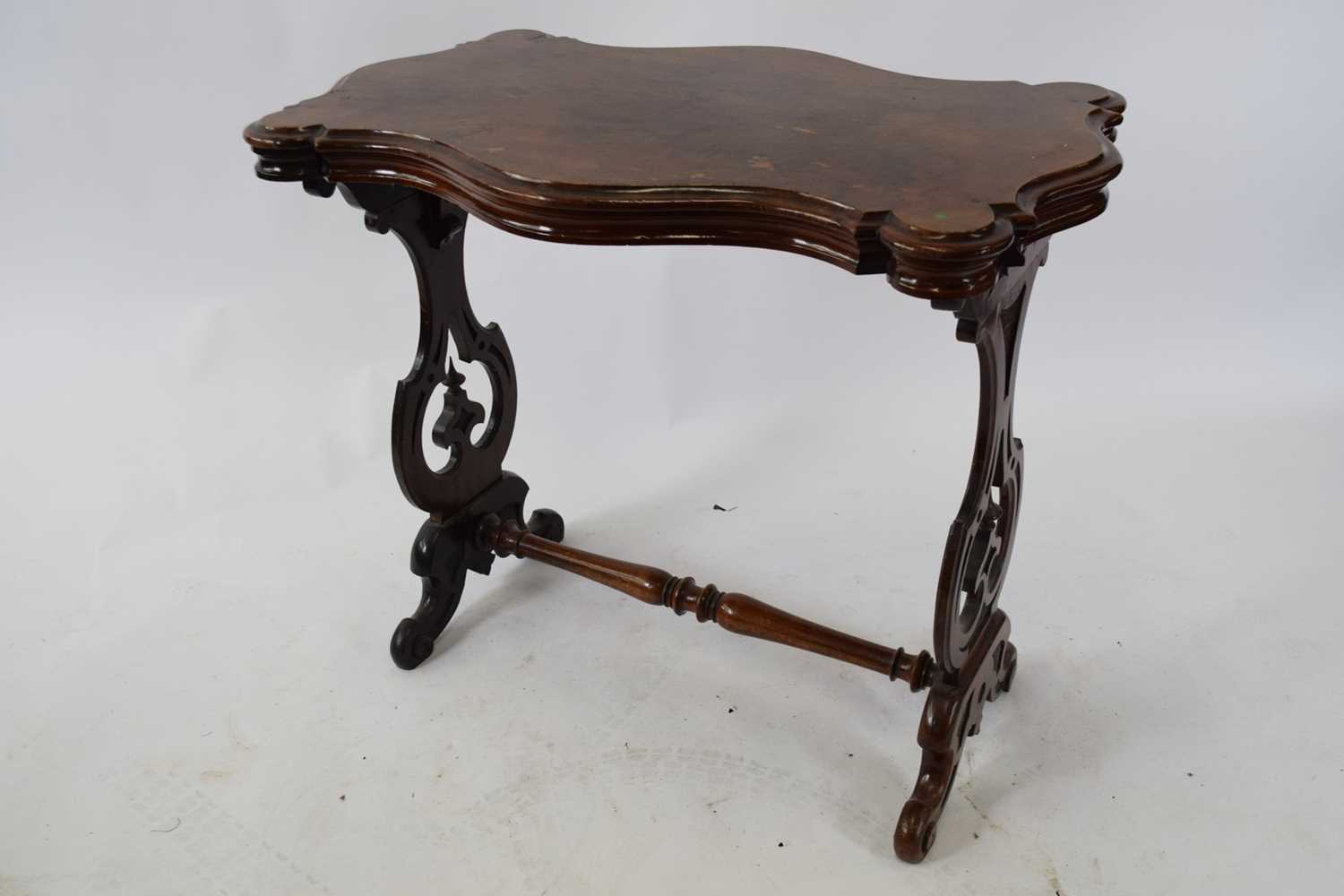 Victorian walnut veneered shaped centre table with pierced end supports and central turned - Image 3 of 3