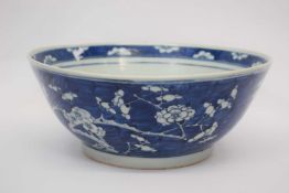 Large Chinese porcelain bowl, the Qiang dynasty, the blue ground decorated with prunus with