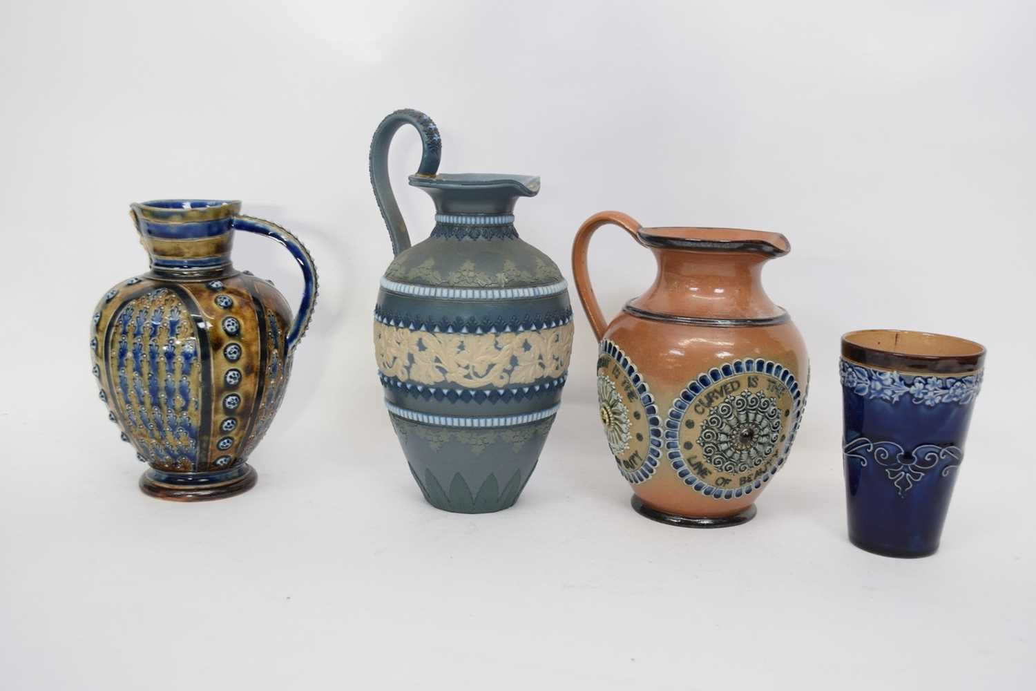 Group of three Doulton ware jugs including one with mask spout and further Doulton commemorative - Image 2 of 2