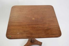 19th century mahogany wine table with rectangular top over a tapering column with leaf carved detail