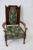 Late Victorian mahogany framed armchair, the back decorated with inlaid floral detail and