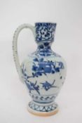 Porcelain ewer with a blue and white design of flowers