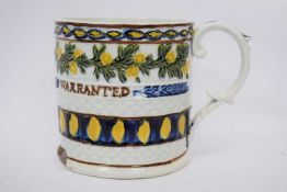 Staffordshire pottery frog mug entitled 'Winchester measure warranted', with frog to interior (large