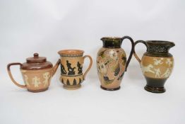 Group of Doulton wares including a jug with sprigged Egyptian design, further jug with sporting