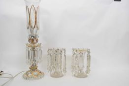 Pair of table lustres of plain glass, together with a further table lustre converted to a lamp, with