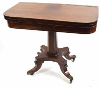 Regency rosewood fold-over card table with brass inlaid detail set on a pillared support and four