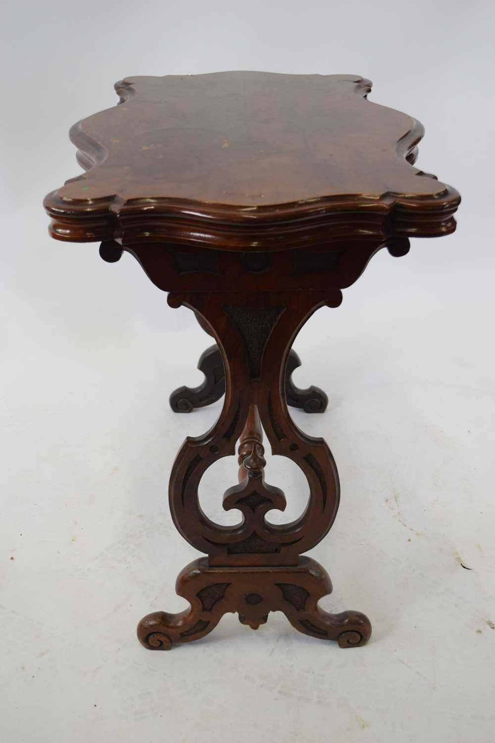 Victorian walnut veneered shaped centre table with pierced end supports and central turned - Image 2 of 3