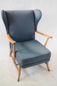 Vintage Ercol blue upholstered armchair with loose cushion to seat, 85cm high