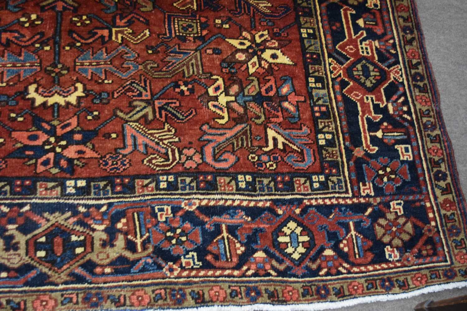 20th century Heriz wool floor rug decorated with stylised floral and geometric design on a - Image 2 of 3