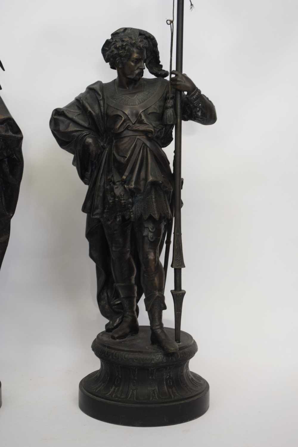 Two large spelter figures of European warriors, both holding spears, mounted on circular bases - Image 3 of 5