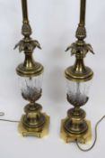 Pair of brass lamps with cut glass reservoirs, 68cm high (2)