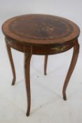 French marquetry inlaid rosewood and mahogany ormolu mounted circular occasional table, the top