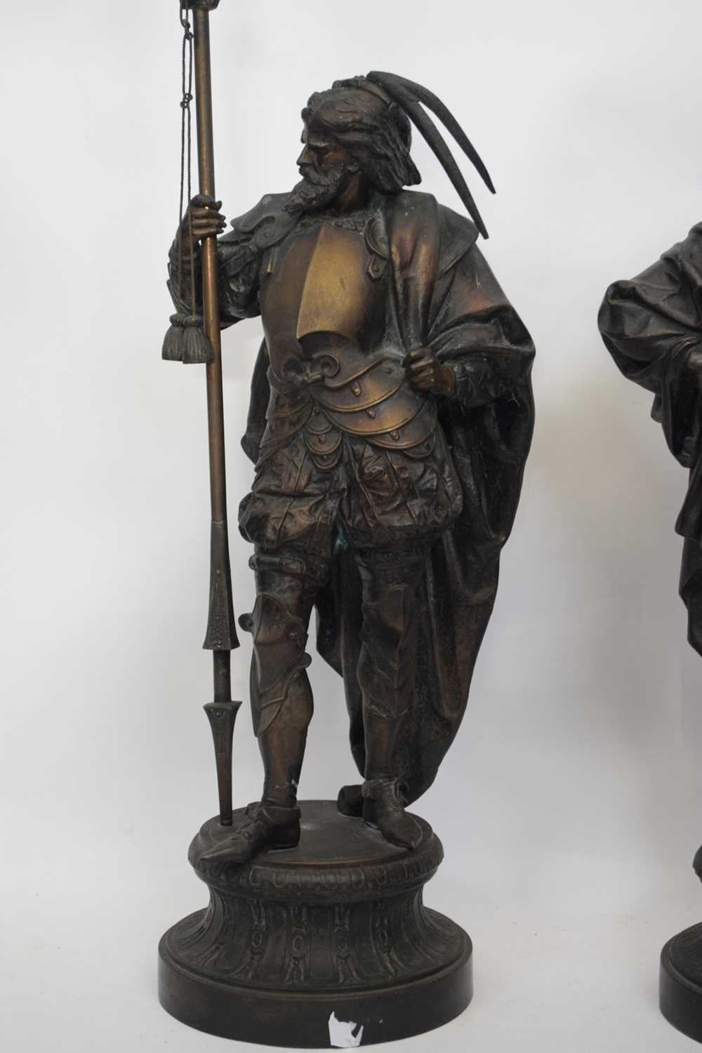 Two large spelter figures of European warriors, both holding spears, mounted on circular bases - Image 4 of 5