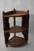 Indian hardwood corner whatnot with carved side supports, 82cm high