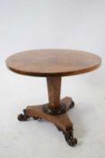 Small Victorian walnut veneered circular top occasional table raised on a shaped pedestal and