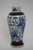 19th century Chinese porcelain vase decorated in underglaze blue with a dragon chasing the flaming