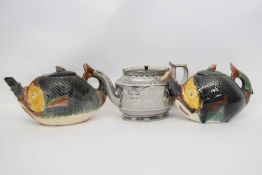 Group of three tea pots, two Majolica style modelled as fish and further lustre ware pot with