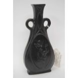 Royal Doulton vase by Leslie Harradine of flat ended form, the black ground decorated with