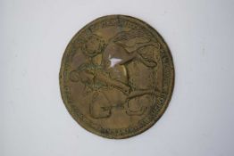 Brass plaque with model of Oliver Cromwell on horseback with Latin inscription to border