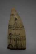 Large ivory tusk, early 20th century, carved in erotic style with figures, 15cm high