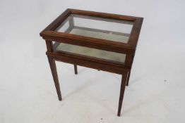 Small mahogany framed bijouterie display table with hinged lid and tapering legs, 46cm wide
