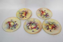 Group of five Minton Apple plates signed by various artists including H Holland, L Woodhouse, J