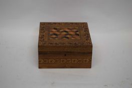 19th century Tunbridge ware box of hinged square form, the lid decorated with geometric design of