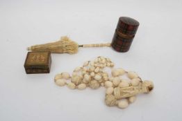 Bag containing quantity of vintage ivory beads and child's silk toy parasol with ivory handle,