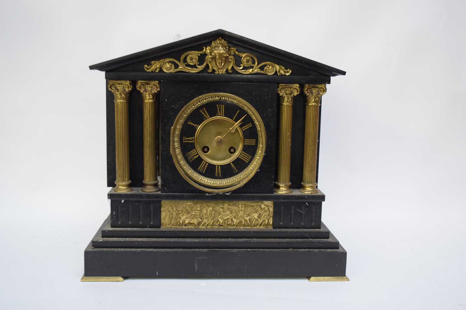 Late Victorian black slate cased mantel clock, the dial with Roman numerals to a twin train movement