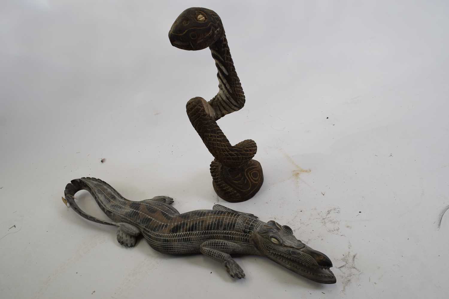 Tribal/ethnographica interest - Papua New Guinea floor standing wooden model of a snake with inset