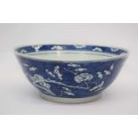 Large Chinese porcelain bowl, the Qiang dynasty, the blue ground decorated with prunus with