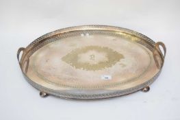 Large oval galleried silver plated serving tray with looped handles, 61cm wide