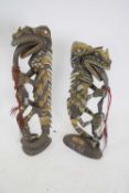 Tribal/ethnographica interest - Papua New Guinea two carved wooden models of lizards with inset