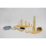 Group of ivories, Meiji period, including two models of a Chinese junk, a carved ivory fan and shell