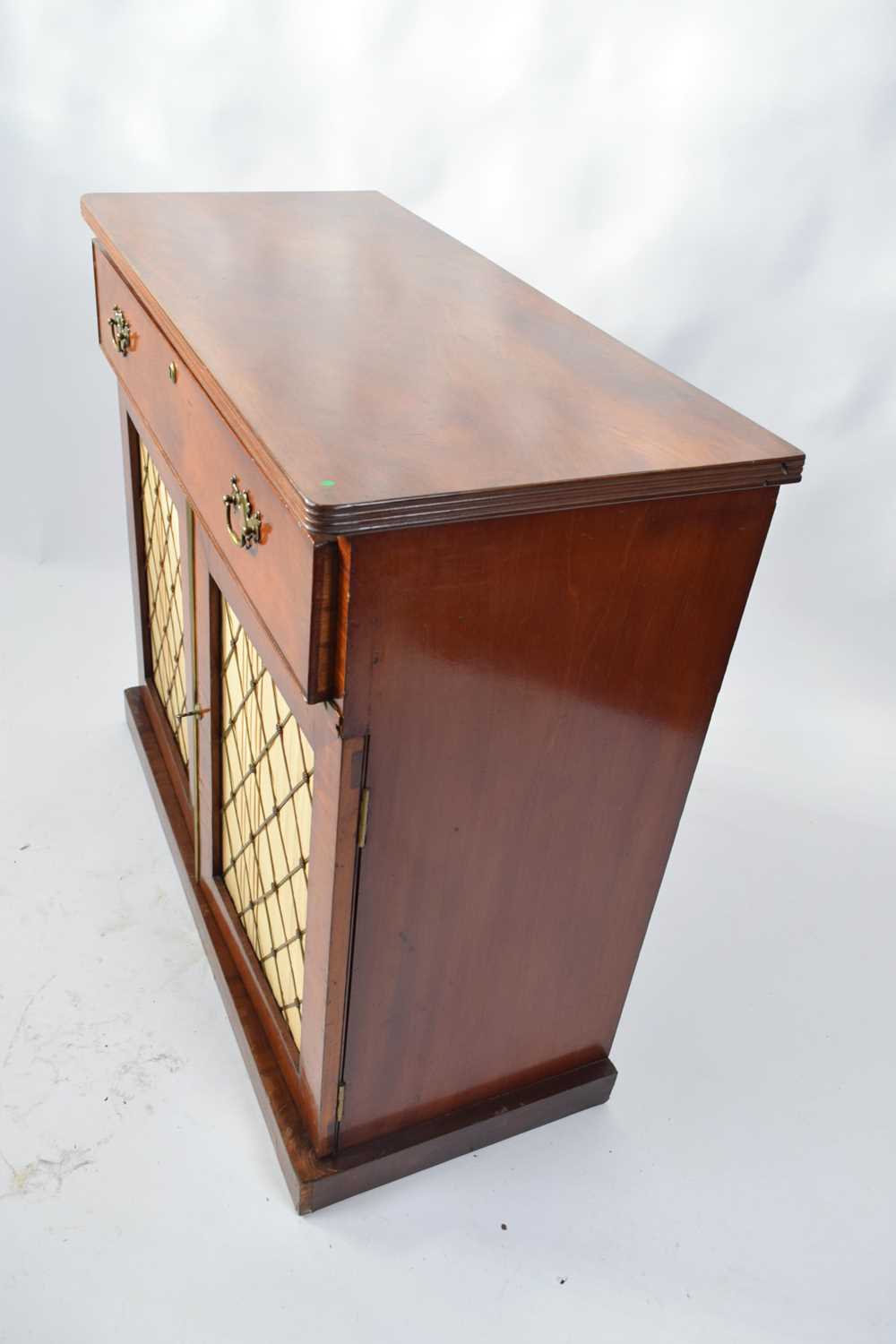 19th century mahogany small sideboard with single drawer over two mesh and fabric covered doors, - Image 3 of 3