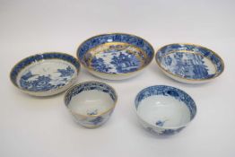 Group of Chinese 18th century porcelains with typical blue and white designs and gilded