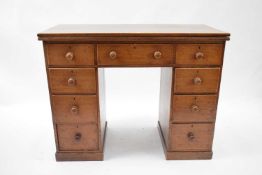 Late 19th/early 20th century mahogany twin pedestal desk with unusual fold-over top and a body